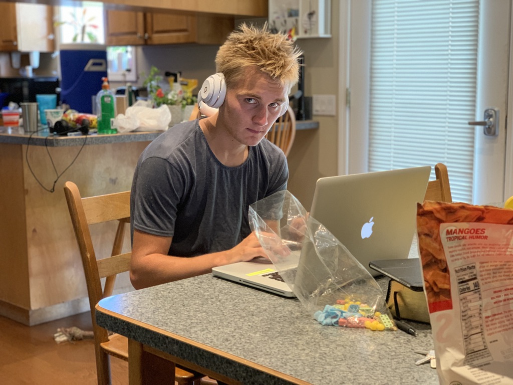Austin producing at his laptop